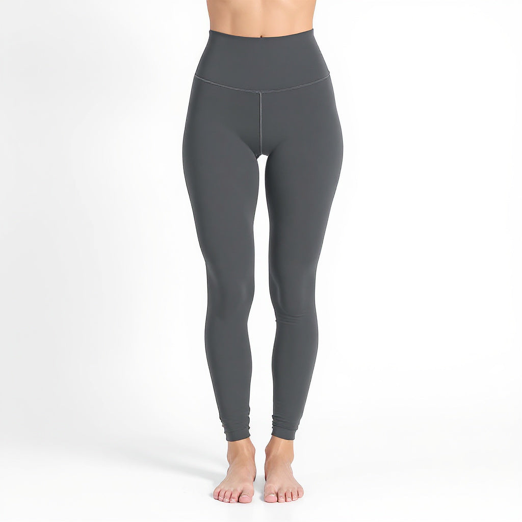 Women Nylon-Spandex Yoga Leggings shown beside a yoga mat indicating size